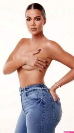 Khloe Kardashian strips topless in racy snap as mum says everyone fancies her