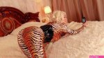 Beautiful hot blonde MILF doing selfies in spandex catsuit
